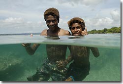 An over-under shot of some children in Vanuatu